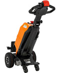Heavy Duty Electric Powered Tugger With 2,200 Lbs Capacity positioned at an angle showing durable frame and wheels.