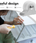 Close-up of Ultra Silent PVC Caster Wheels for Office Chairs and Furniture being installed on furniture with a screwdriver.