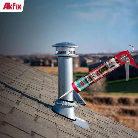 Knockout Heat Resistant Fireplace Sealant Handles 2700 Degrees Like A Pro for sealing chimney on roof with gray metal pipe.