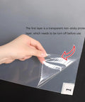 User peeling back non-sticky protective layer from Heavy Duty 300 Sheet Adhesive Tacky Mats For Sweeping Dust Dirt And Grit Off Boots And Equipment Wheels Quick Peel Replacement Layers For Cleanrooms Hospitals Labs Construction Sites And Offices Straight Clean Setup Every Time.