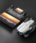 Drone with Screen Controller and Two Batteries, Altitude Hold, One Key Takeoff and Landing, Foldable design on black background