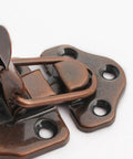 Vintage Red Bronze Toggle Latch For Wood Jewelry Box Suitcase Clasp Hardware With Screws Solid Zinc Alloy locking mechanism close-up.