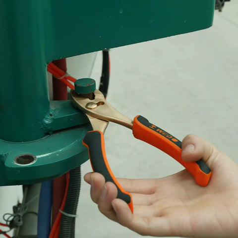Using pliers from Non Sparking 62 Piece Tool Set With Sledge Hammer Ball Pein Hammer Claw Hammer Wrenches Pliers Chisels And Screwdrivers For Safe Metal Work Pro Grade Heavy Duty Beryllium Copper Non Magnetic Corrosion Resistant DIN Standard BAM Certified on machinery