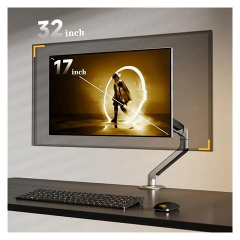 Fully Adjustable Single Monitor Mount For Desk Featuring Mechanical Spring Arm With Super Smooth Tilt And Rock Solid Bracket Design Supporting 17 To 32 Inch Screens Up To Twenty Pounds Easy Install showing a 32 inch monitor at an optimal angle.