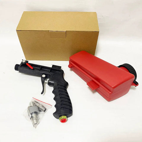Wreck Old Rust And Peeling Paint Fast With This Heavy Duty Gravity Sandblaster Gun Kit Using A Ninety Psi Pneumatic Trigger To Prep Metal And Wood Smooth Without Breaking A Sweat In Red, featuring gun, red hopper, and accessories.