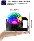 Compact Sound Activated Party Lights With Remote DJ Lighting 7 Modes Rotating Disco Ball held in hand