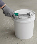 Heavy Duty Tough As Nails Multi Function Paint Pail Opener Alloy Drum Wrench With Chunky Non Slip Handle Opens Stuck Lids in use on a paint bucket.