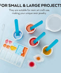 Silicone Resin Measuring Cup Tool Kit With 250 Ml And 100 Ml Cups, sticks, pipettes, and molds for epoxy resin mixing.