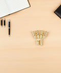 Metal Table Pins And Dowels Set For Furniture Joints And Desk Assembly on a wooden desk with pens and notebook
