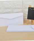 Blank White Invitation Envelopes 40 Pack With 20 Top Opening And 20 Side Opening Flaps Hand Made And High Quality shown on table
