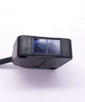 Indoor Wall Mounted Photoelectric Beam Sensor With Dual Voltage 12 To 240 VDC And 24 To 240 VAC, close-up view of sensor housing.