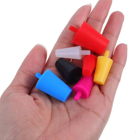 Get Your Bottles Secure With These Rad Silicone Plug Sleeves Kit Featuring 35 Heat Resistant Tapered Wine Bottle Stoppers Perfect For Sealing Sparkling Drinks Plus Protective Cap For Painting Projects And Keepin G Items Dry Clean Without The Mess Or, assorted silicone tapered stoppers in hand