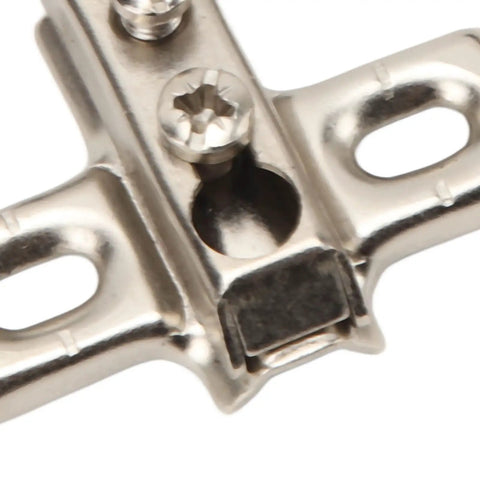 Close-up of steel hinge from Fifty Pack Half Inch Overlay Concealed Cabinet Hinges With Self Closing Soft Close Damper For Glass Cabinets And Bookcase Doors Ideal For Kitchen Cabinets Offices And Display Units Pro Grade Easy Install Durable Steel Construction