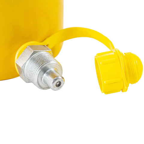 Close-up of yellow hydraulic cylinder with a metal threaded stud and yellow plastic cap.