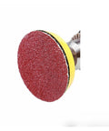 Close-up of a durable aluminum oxide 2 inch sandpaper disc for grinding and polishing metal or wood.