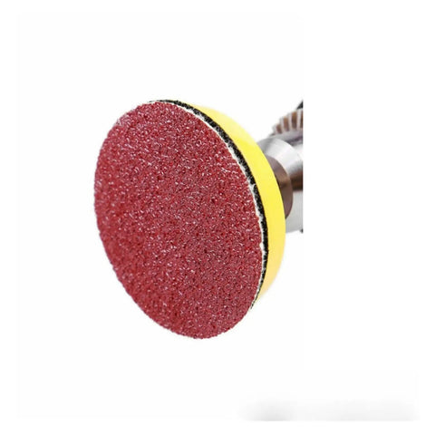 Close-up of a durable aluminum oxide 2 inch sandpaper disc for grinding and polishing metal or wood.