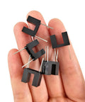 Hand holding ITR9608 F Photoelectric Switch Optical Interrupter Sensor DIP-4 Pack Of 20 for DIY projects