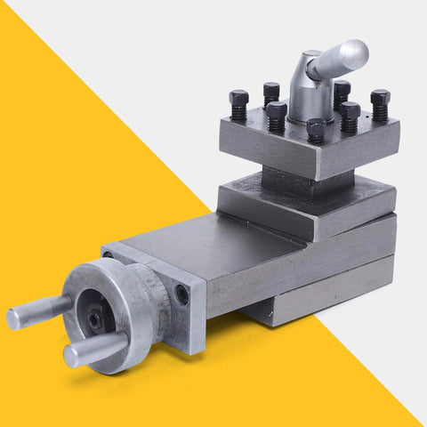 Front view of AT300 industrial swing lathe tool post assembly in gray metal with bolts and graduated dial.