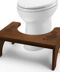 Wooden Toilet Stool For Kids And Adults, Anti Slip Bamboo Potty Training Step Stool, 7 Inch Rise, placed in front of a toilet
