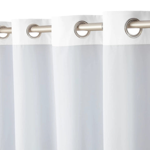 Close-up of white room darkening blackout curtain panels with grommets set of 2, 52 by 63 inches for privacy and noise blocking.