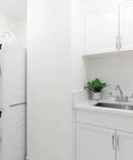 Laundry room with Two-Handle Laundry Faucet With Chrome Finish For A No-Nonsense Laundry Upgrade, 360-Degree Swivel Spout, 5-1/2-Inch Reach