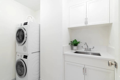 Laundry room with Two-Handle Laundry Faucet With Chrome Finish For A No-Nonsense Laundry Upgrade, 360-Degree Swivel Spout, 5-1/2-Inch Reach
