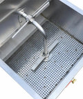 Mobile Fryer Oil Filter System Built Dead Serious With 304 Stainless Steel And Smooth Electric Filtration Machine On Rolling Cart For Straight Up Easy Cleanup Of Deep Fryers With 110V Power showing the interior with perforated base and filtration pipe.
