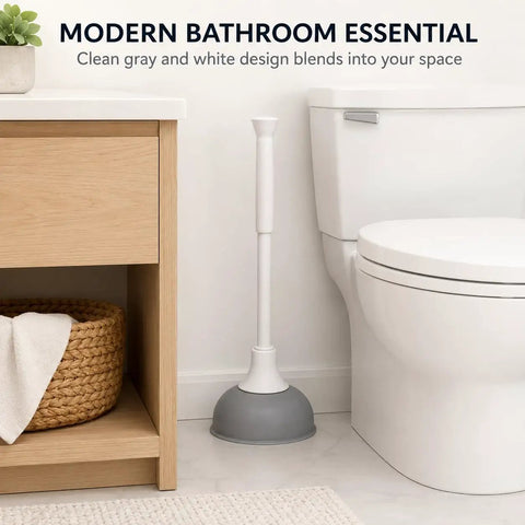 Slick Modern Toilet Plunger With 19 Inch Handle And Gray Rubber Cup Kicks Clogs Fast And Features A Snazzy Three Piece Design stored next to toilet.