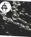 Heavy Duty Steel Motorcycle Chain Tensioner Tool Knockout Adjuster for Dirt Bikes and Cruisers, close-up of chain links.