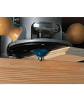 Real Badass 1/8 Inch Radius Roundover Router Bit With Two Flute Micrograin Carbide Cutting Edges and Compact Ball Bearing Guide in use on wood.