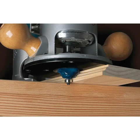 Real Badass 1/8 Inch Radius Roundover Router Bit With Two Flute Micrograin Carbide Cutting Edges and Compact Ball Bearing Guide in use on wood.