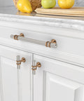 10 Pack Brushed Satin Nickel And Champagne Bronze Cabinet Knobs Set installed on white kitchen cabinet