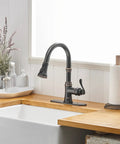 Oil Rubbed Bronze Kitchen Faucet With High Arc Gooseneck Pull Down Sprayer 3 Function Spray Head Single Handle Heavy Duty Commercial RV Kitchen Sink Faucet Solid Brass Construction Drip Free Ceramic Valve Deck Plate Included installed on wooden countertop