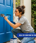 Woman using paint brush from 12 Pack 3 Inch Flat Paint Brushes For Walls Trim Cabinets Doors Premium Contractor Grade Set on blue door