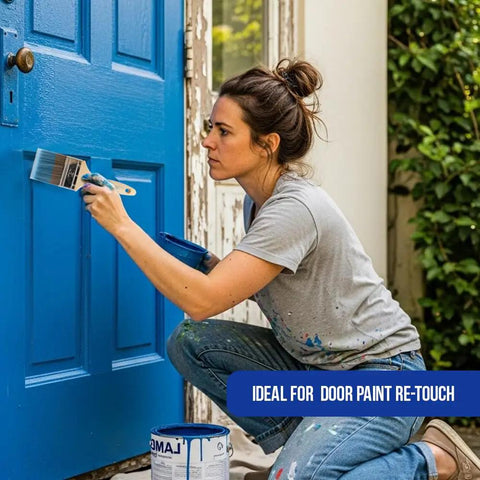 Woman using paint brush from 12 Pack 3 Inch Flat Paint Brushes For Walls Trim Cabinets Doors Premium Contractor Grade Set on blue door