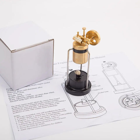 Retro Three Legged Oscillating Steam Engine Model Kit with manual and box, showcasing brass and black components