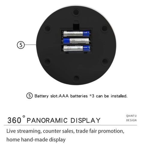 Battery slot for the sleek motorized rotating display stand, holding three AAA batteries for powered operation.