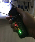 Person using Non Contact Voltage Detector Pen AVD06 12-1000V With Auto And Manual Modes Adjustable Sensitivity NCV Live Wire Check