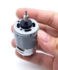 High Performance DC Motor RS 380PH 4045 Upgrade For Hair Clipper Repair 2.6V To 13V Gearbox Replacement Part in hand.