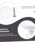 Close-up of Six Pack White Alloy Round Cabinet Door Handles for Wardrobe and Kitchen Cabinets, showing surface texture and screw.