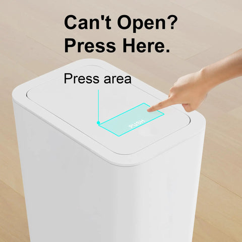 Hand pressing lid of Three Pack 10L Small Trash Cans With Lids Pop Up Lid Space Saving Slim Waste Baskets for kitchen