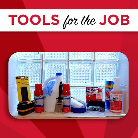 Various tools for home improvement in front of glass blocks, including sprays, brushes, and cleaning supplies.
