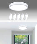 Five Pack LED Flush Mount Ceiling Lights 24W 11.81 Inch Round Surface Mounted Down Lights 5000K Cool White For Kitchen Closet Hallway Stairwell Dining Room Modern Energy Efficient Ceiling Fixture installed in a room with natural light.