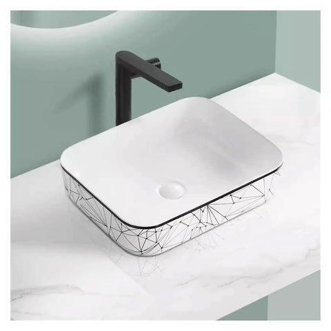 USZWBY Vessel Sinks Nordic Household Wash Basin Modern Above Counter Single Art Ceramic Bathroom Balcony Bathroom Bowl Sink on marble countertop with black faucet.