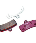 Performance Semi Metallic 4 Piston Bicycle Brake Pads Set including caliper spring, showing pad surface and backing details