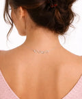 Back view of woman wearing Set Of 4 S Hook Necklace Extenders With Gold And Silver Swirl Hooks Durable Metal Jewelry Extenders