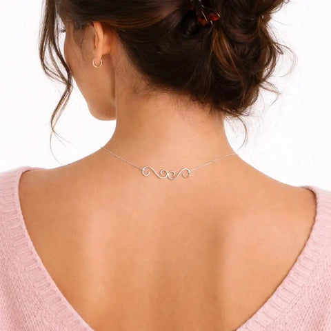 Back view of woman wearing Set Of 4 S Hook Necklace Extenders With Gold And Silver Swirl Hooks Durable Metal Jewelry Extenders