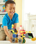 Child playing with colorful Gears Wrecker STEM Kit For Kids And Toddlers, 47 Piece Construction And Fine Motor Skills Set For Ages 4 And Up
