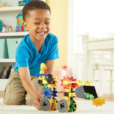 Child playing with colorful Gears Wrecker STEM Kit For Kids And Toddlers, 47 Piece Construction And Fine Motor Skills Set For Ages 4 And Up
