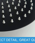 Close-up of nozzles on 8 Inch Matte Black Stainless Steel Rain Shower Head With High Flow Water Pressure Boost Ultra Thin Design Heavy Duty Rainfall Head For A Premium Shower Experience Worth The Hype